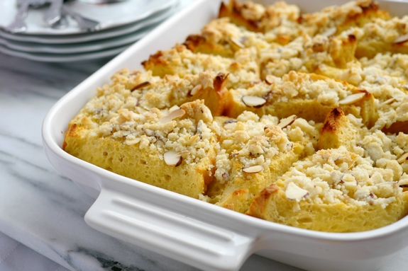VIDEO + RECIPE: I can't think of a better way to wake up than with this Streuseled Overnight French Toast. You will appreciate how easy such a wonderful tasting breakfast is to put together. Enjoy it for Sunday brunch or a holiday meal. If there are any leftovers, they taste great too, from NoblePig.com. #noblepig #mothersday #frenchtoast #breakfast #overnightfrenchtoast