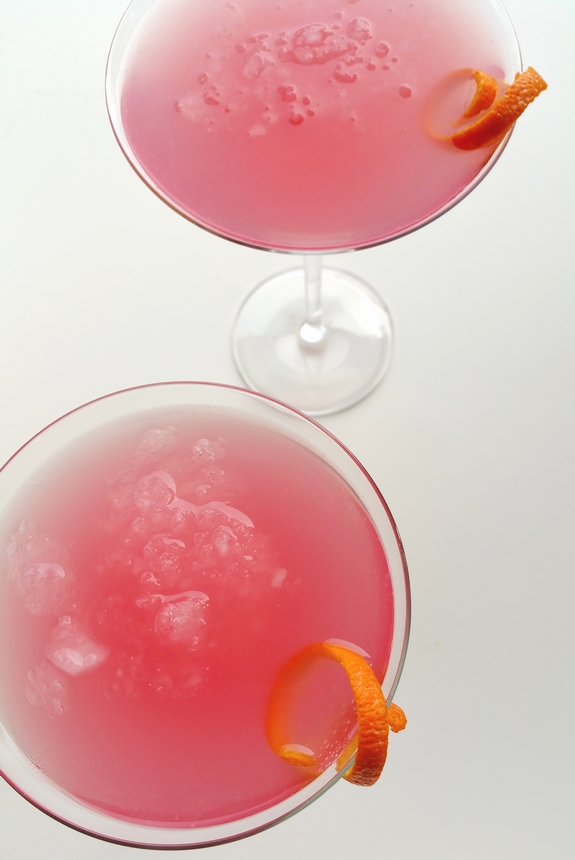 Why would you want to drink anything other than the World's Best Cosmopolitan Cocktail? The only thing girly about this cosmo drink is its color. Overhead look at two of the World's Best Cosmopolitan Cocktails.