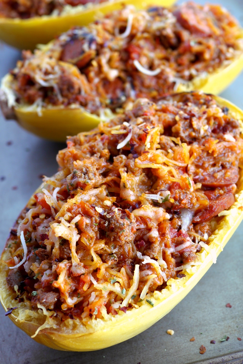 All the flavors of a hearty spaghetti dinner packed into a tender, roasted spaghetti squash. This Stuffed Spicy Italian Spaghetti Squash Boats recipe are the answer to comfort food made in a healthy way. A fork is all it takes to separate the pale orange strands of the gourd into vegetable noodles. It couldn't be easier to make. All the flavors of a hearty spaghetti dinner packed into a tender, roasted spaghetti squash. This Stuffed Spicy Italian Spaghetti Squash Boats