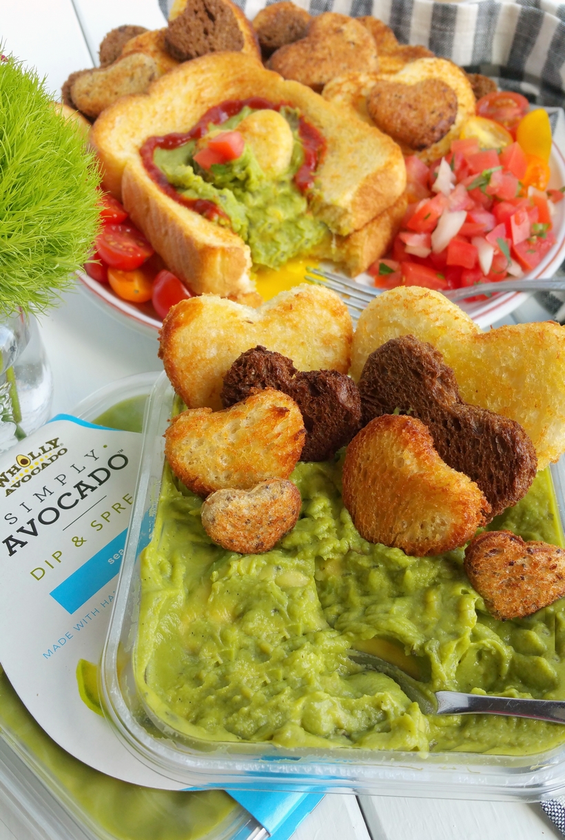 Let Mom sleep in and then wake up to a delicious, restaurant-quality, avocado style, Mother's Day breakfast in bed. If your Mom is anything like me, she will appreciate those extra winks and a thoughtful meal that pays homage to her love of avocados, with a surprise egg underneath. This gorgeous breakfast plate is easy enough for children of all ages to help prepare from NoblePig.com. #noblepig #mothersday #avocado #breakfastinbed #avocadotoast #simplyavocado #whollyguacamole