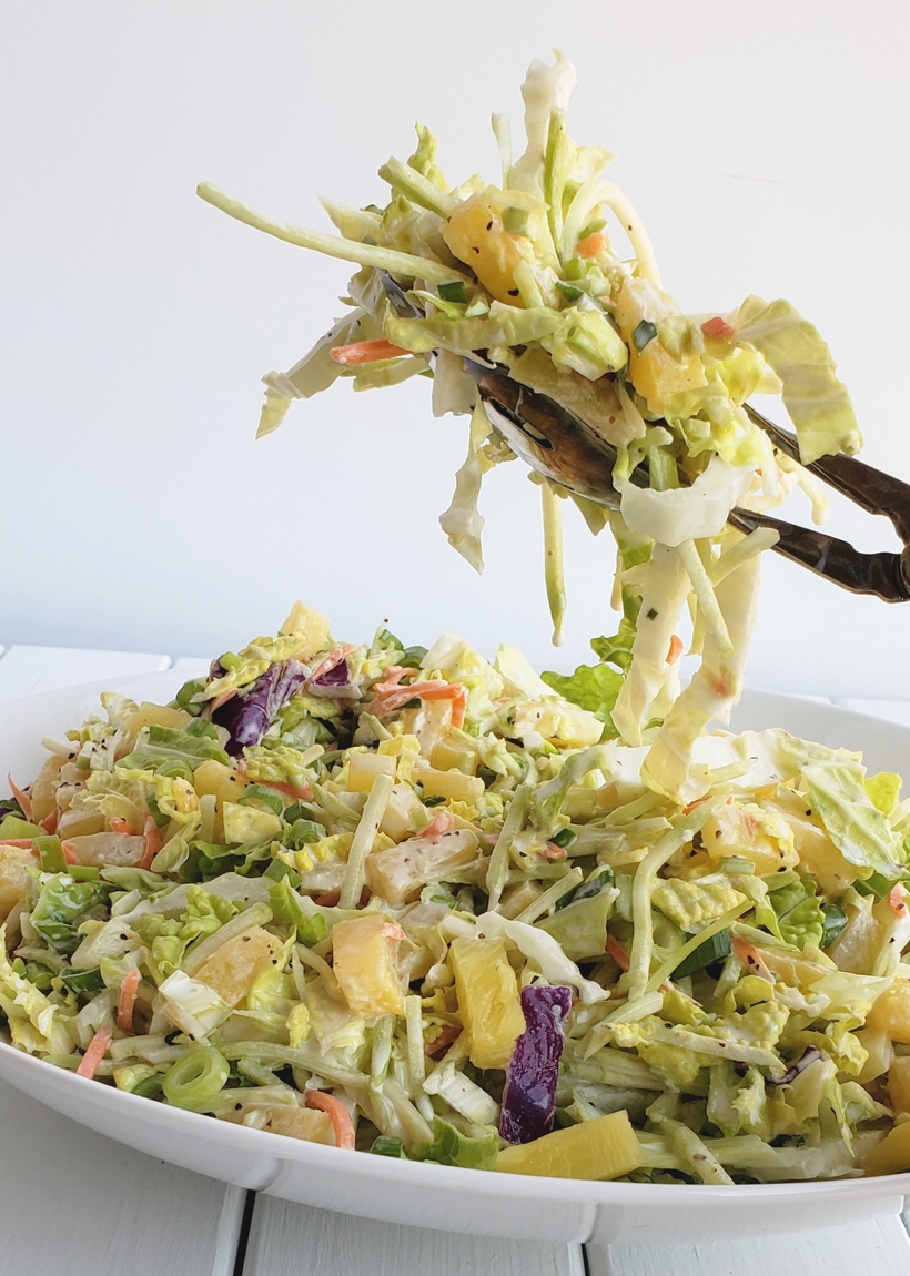 This Easy Pineapple Coleslaw is going to remind you of summer all year long. Enjoy as a side dish or top your favorite chicken burger with this one. Pineapple coleslaw