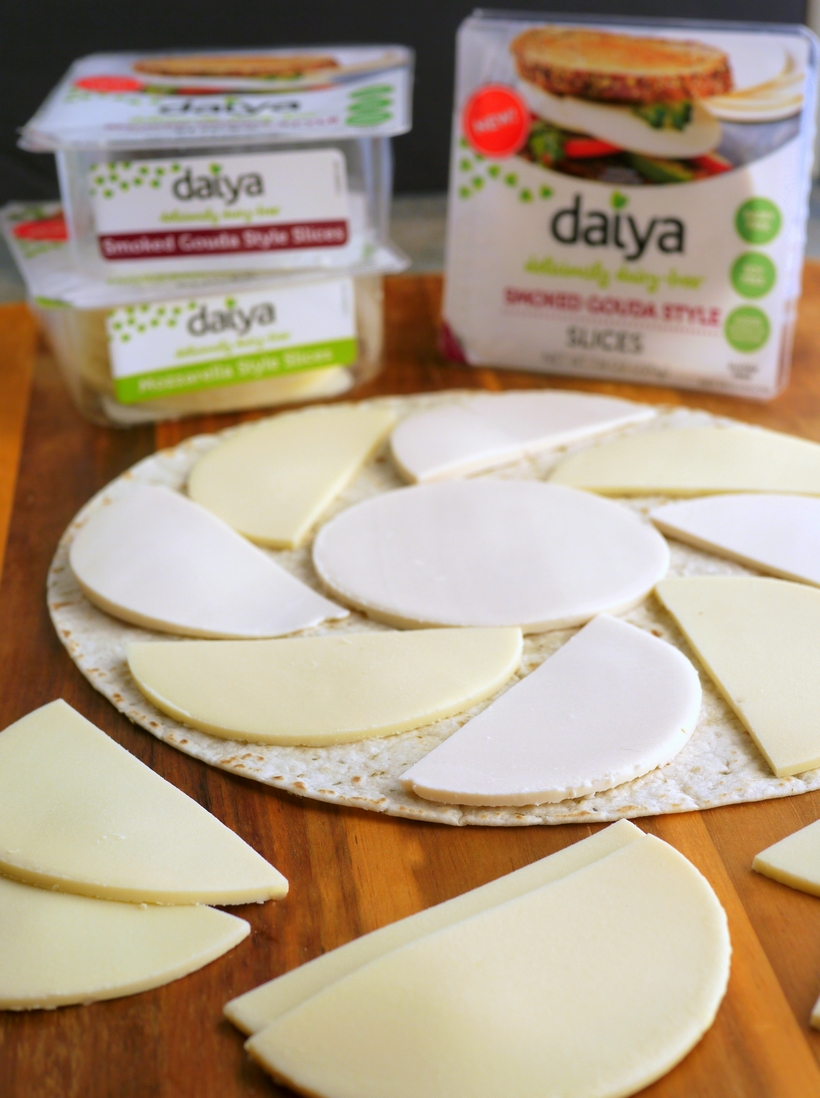 Fill that new lunchbox with these delicious Melty Smoked Gouda, Mozzarella and Apple Pinwheels. You will have a hard time believing this luscious tasting cheese is dairy-free! #noblepig #dairyfree #backtoschool #lunchbox #smokedgouda