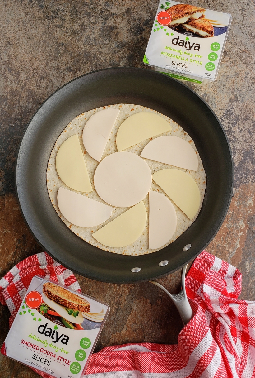 Fill that new lunchbox with these delicious Melty Smoked Gouda, Mozzarella and Apple Pinwheels. You will have a hard time believing this luscious tasting cheese is dairy-free! #noblepig #dairyfree #backtoschool #lunchbox #smokedgouda