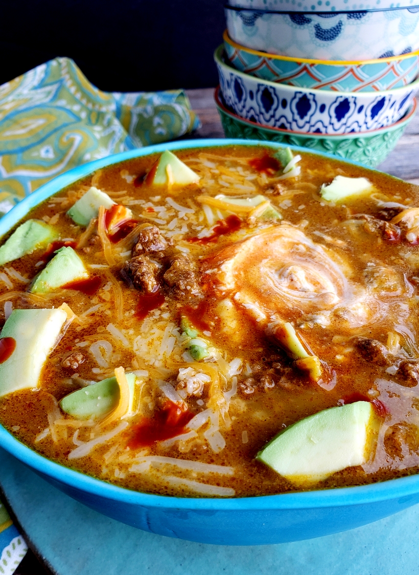 Easy, delicious and ready in under thirty minutes, this Spicy Low Carb Hamburger Soup is a hearty and warming dinner. Since it makes a large batch, there will be enough leftovers for lunches and dinners that week. This soup is keto friendly. #noblepig #keto #ketorecipe #lowcarb #easydinner