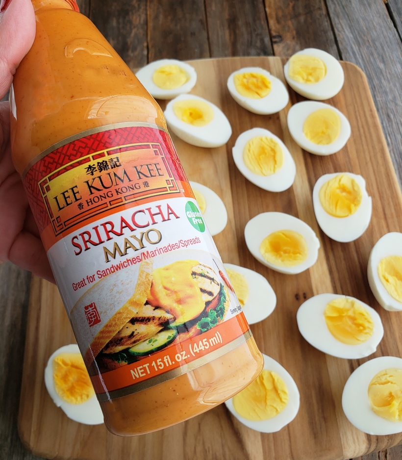 Add a little spice to the appetizer table with these Sriracha Mayo Deviled Eggs. This is a zesty, creamy and splurge-worthy treat you'll want to serve at every event! #noblepig #sriracha #eggs #devliedeggs