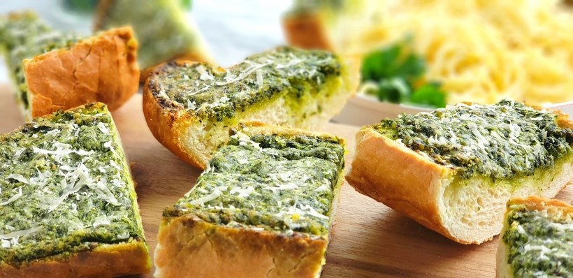 Use up your leftover parsley with this deliciously, flavorful Garlicky, Cheesy Parsley Bread. It's the perfect side dish for a bowl of pasta. #noblepig #parsley #garlicbread