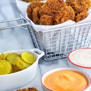 Whip up these Low Carb Air Fryer Pickles in minutes. The perfect guiltless snack for any gathering.