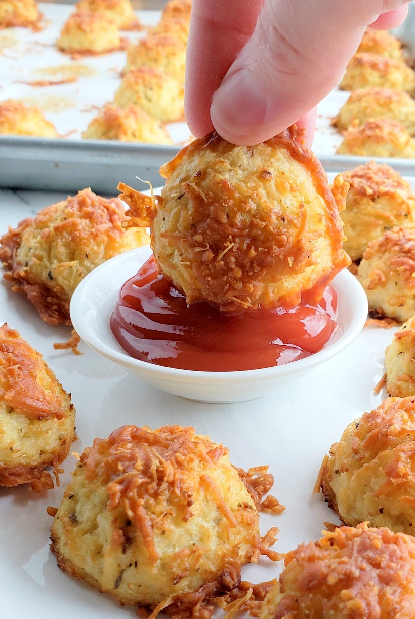 Crispy, cheesy and tasty, these Baked (Low Carb) Parmesan Cauli-Tots are the answer to a healthy dinner side dish everyone in the family will love. #noblepig #cauliflower #tatertots