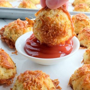 Crispy, cheesy and tasty, these Baked (Low Carb) Parmesan Cauli-Tots are the answer to a healthy dinner side dish everyone in the family will love.