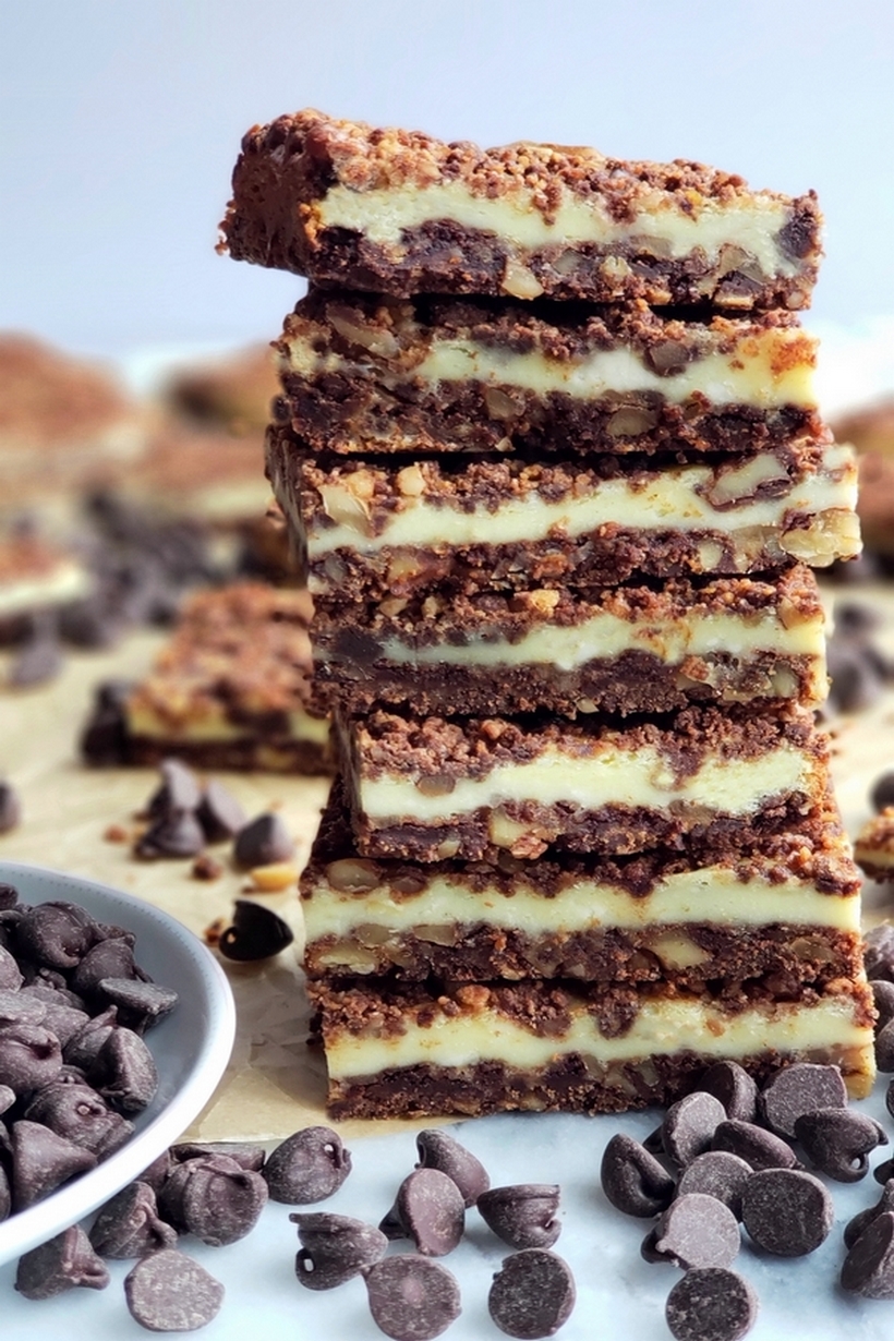 Perfect for any occasion, these Chocolate Cream Cheese Bars feature a unique chocolate graham cracker crust and topping, with a creamy middle layer. #creamcheesedessert