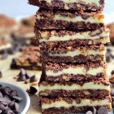 Perfect for any occasion, these Chocolate Cream Cheese Bars feature a unique chocolate graham cracker crust and topping, with a creamy middle layer. #creamcheesedessert