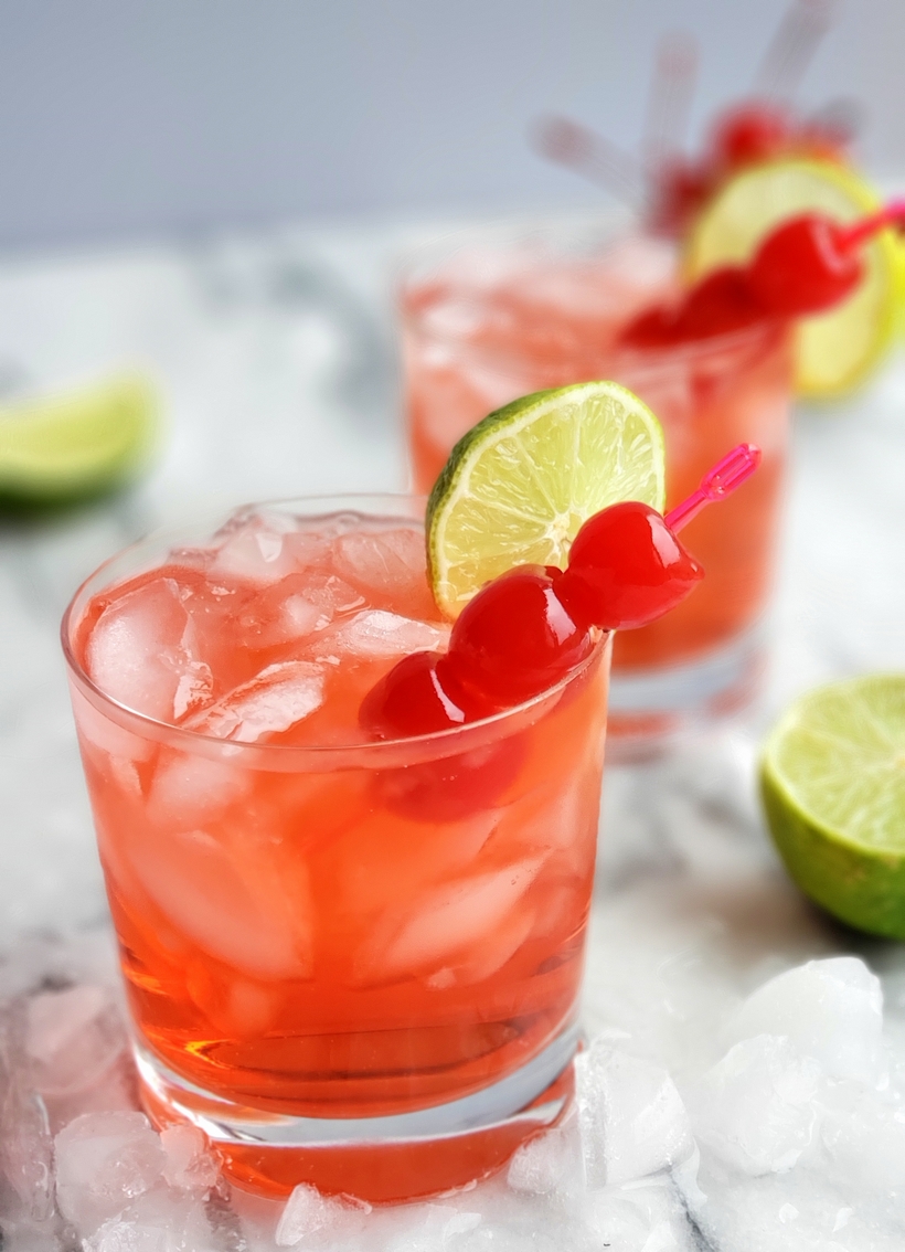 The Dirty Shirley is an adult version of the famous Shirley Temple cocktail. This Dirty Shirley cocktail pays homage to the child star known to complain that her namesake drink was too sweet. #dirtyshirley #shirleytemple adult shirley temple