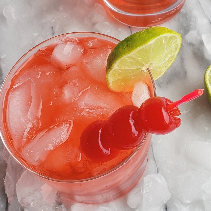 The Dirty Shirley is an adult version of the famous Shirley Temple cocktail. This Dirty Shirley cocktail pays homage to the child star known to complain that her namesake drink was too sweet. #dirtyshirley #shirleytemple Dirty Shirley ingredients