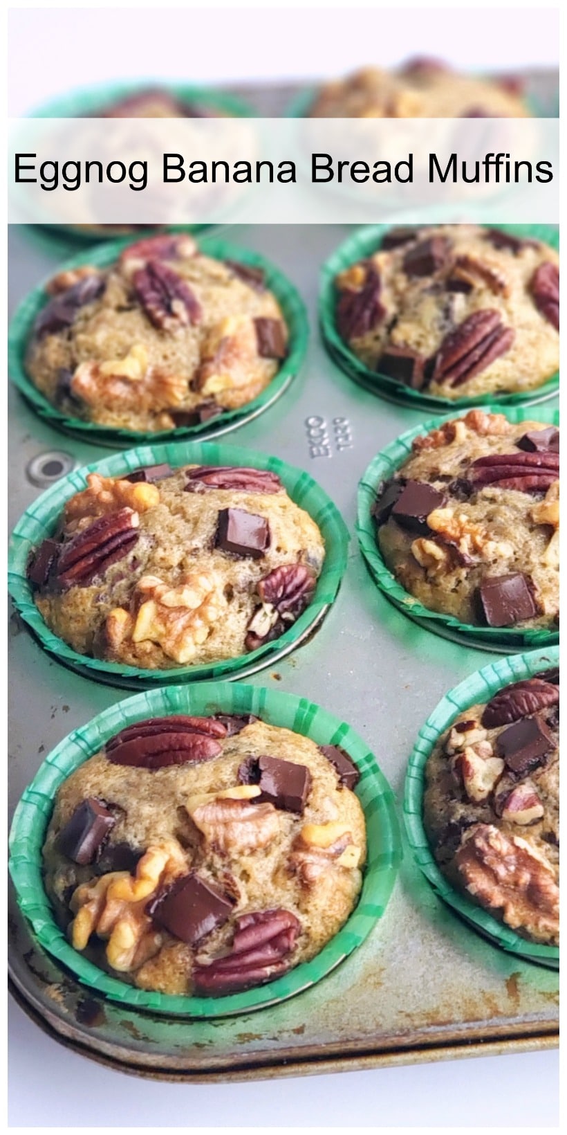 These Eggnog Banana Bread Muffins are tender, delicious and full of pure banana flavor. The eggnog lends a gentle nod to the holidays in a format that is perfect for celebrating Christmas brunch. This holiday breakfast muffin is the perfect cure to hunger while unwrapping those holiday gifts. #noblepig #eggnog #eggnogmuffins #eggnogbananamuffins #holidaybreakfastrecipes #holidaybreakfastideas #christmasbrunch #holidaymuffinrecipe #fluffyeggnogmuffins #christmasbreakfast #muffins #muffinrecipe Text overlay that reads Eggnog Banana Bread Muffins with muffins in a baking tin.