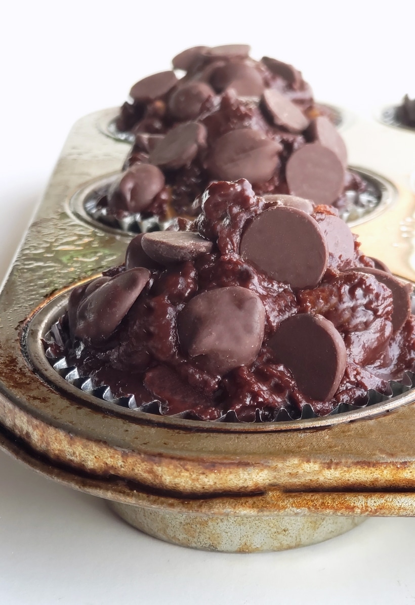 Brownie Muffin batter in a tin ready to be baked.