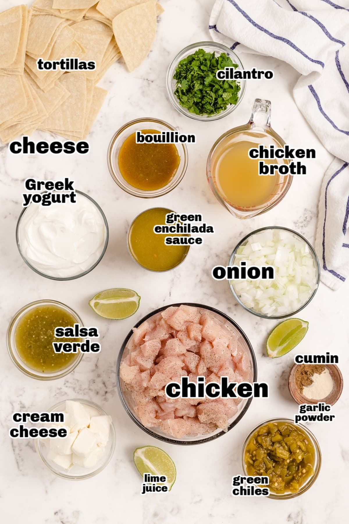 Ingredients for making Green Chile Chicken Enchilada Casserole Ingredients laid out for a cheesy Tex-Mex casserole