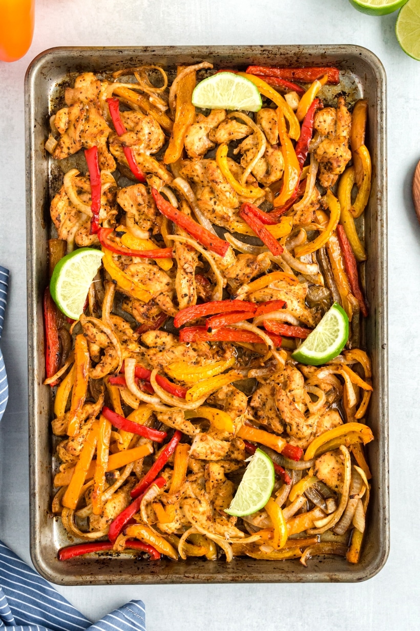 Sheet Pan Fajitas were invented with weeknight meals in mind. Perfectly seasoned, tender chicken and crunchy veggies make this tasty meal one you’ll revisit often. fajitas on a sheet pan