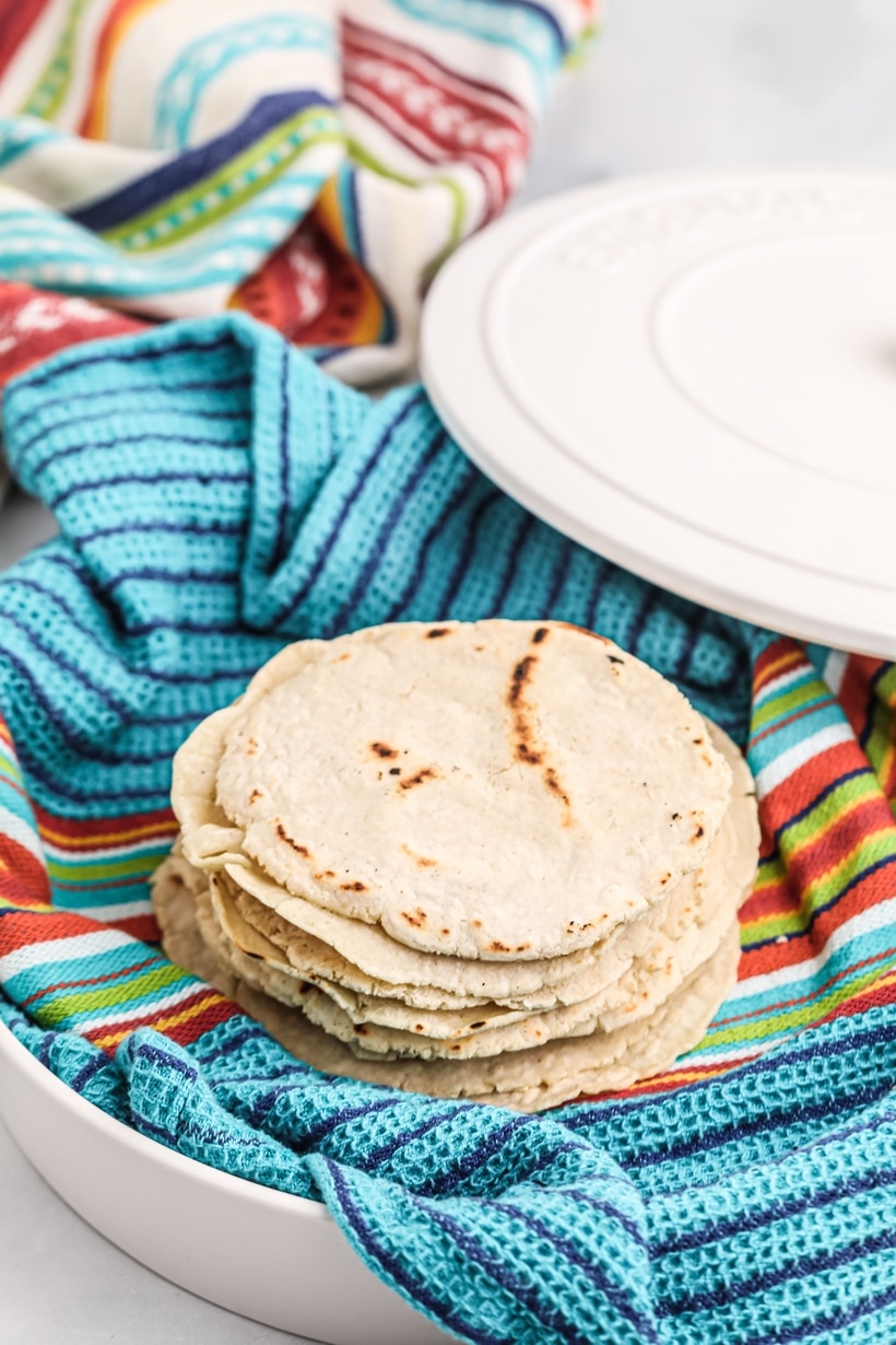 Once you make homemade corn tortillas, you will never buy them again. Corn tortilla making from scratch is a simple two-ingredient process. how to press tortillas