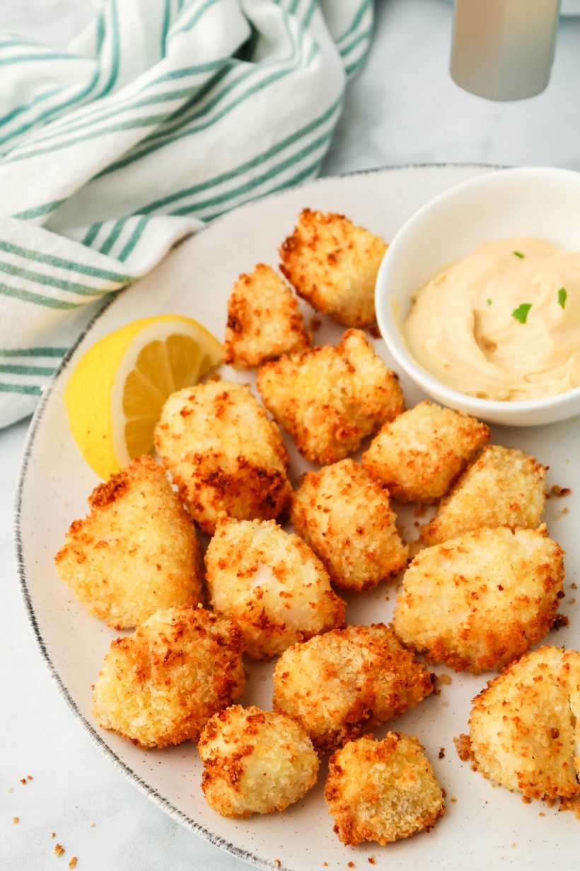 Deliciously flakey fish nuggets made right in your air fryer. These crunchy bites just might replace your kid's chicken nuggets all-together. air fryer fish