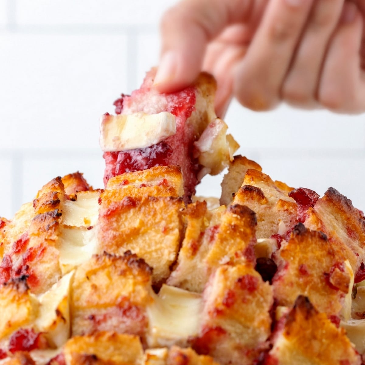 Cranberry Brie pull-apart bread, a festive and flavorful holiday appetizer