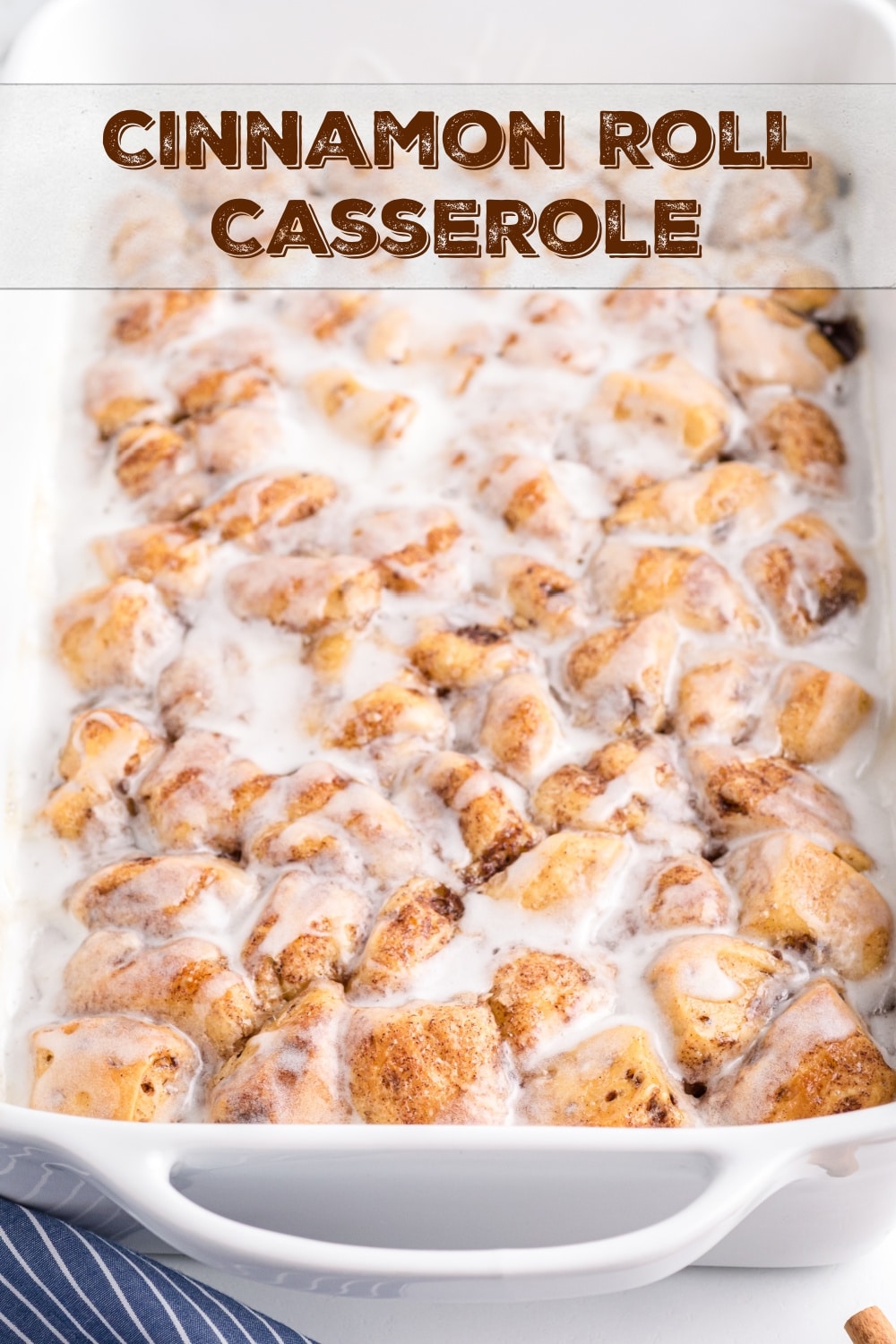 Wake up to the aroma of freshly baked cinnamon rolls with this easy cinnamon roll casserole recipe, perfect for feeding a hungry crowd! Made with Pillsbury refrigerated cinnamon rolls, this easy brunch recipe is simple to put together and an easy breakfast everyone loves. via @cmpollak1