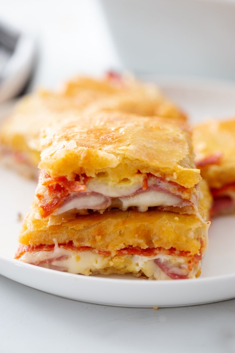 Pillsbury antipasto squares stacked on a plate