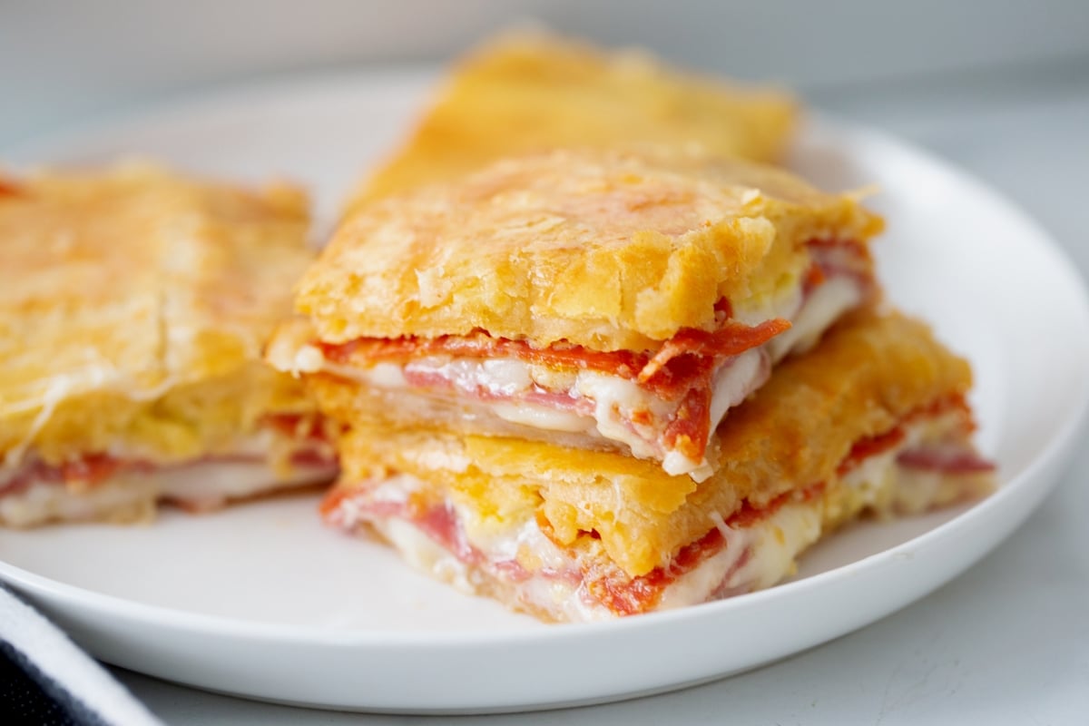 cheesy antipasto squares on a plate