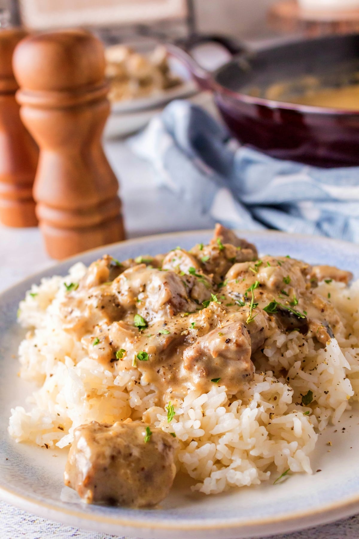 Rich and creamy beef stroganoff with heavy cream Close-up of beef stroganoff in creamy sauce served over rice