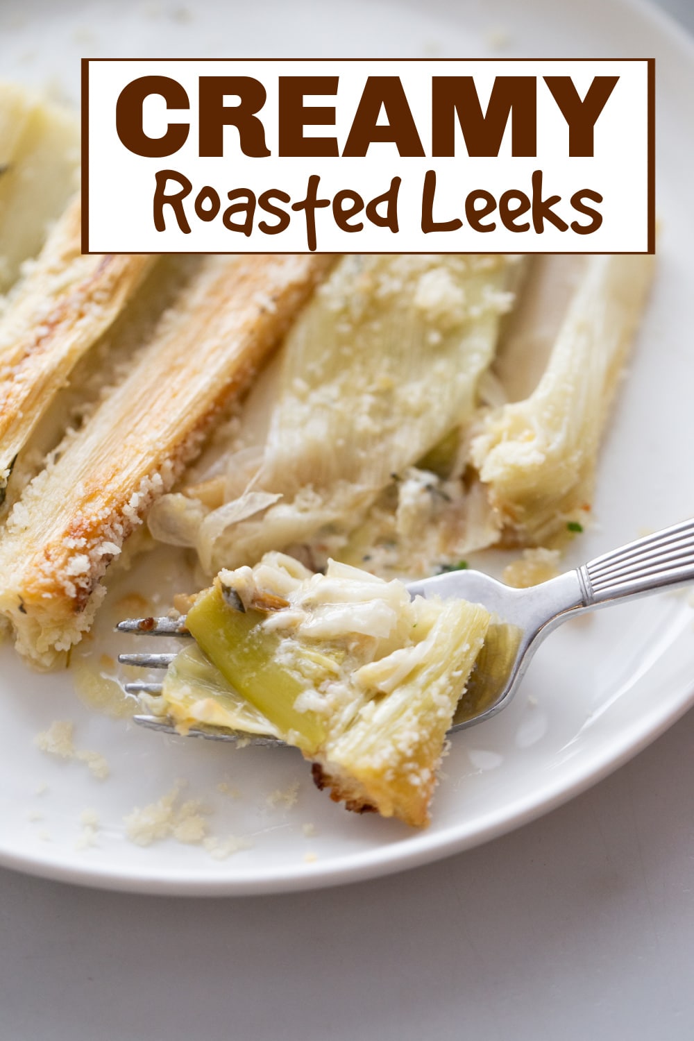 These creamy roasted leeks are roasted right in a rich garlic sauce with thyme and Parmigiano, creating a savory, melt-in-your-mouth vegetable side dish. Perfect for winter when leeks are in season, this dish pairs especially well with roast chicken. Simple to make and full of flavor, it’s a great addition to any meal. via @cmpollak1