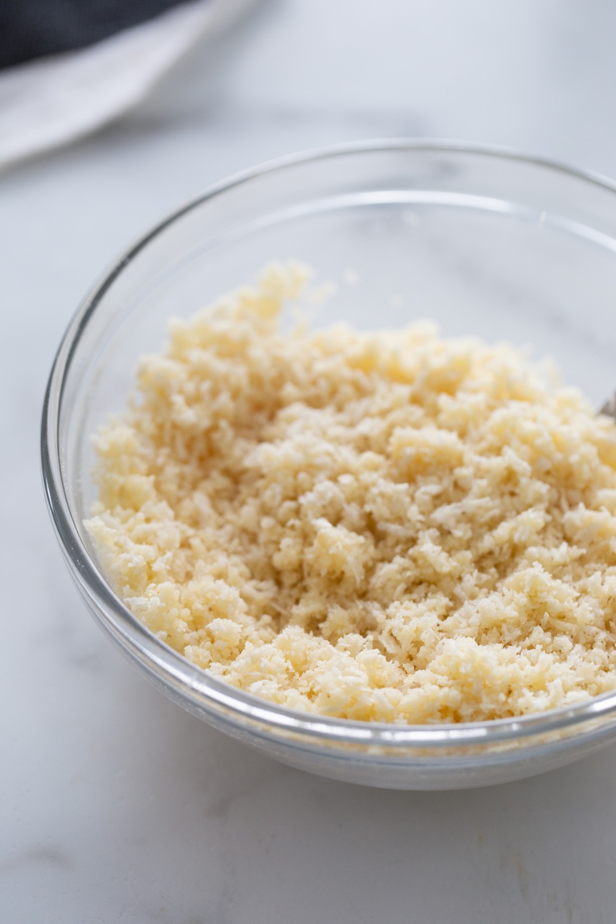Jalapeño Popper Dip making of the breadcrumb topping breadcrumb topping in a bowl