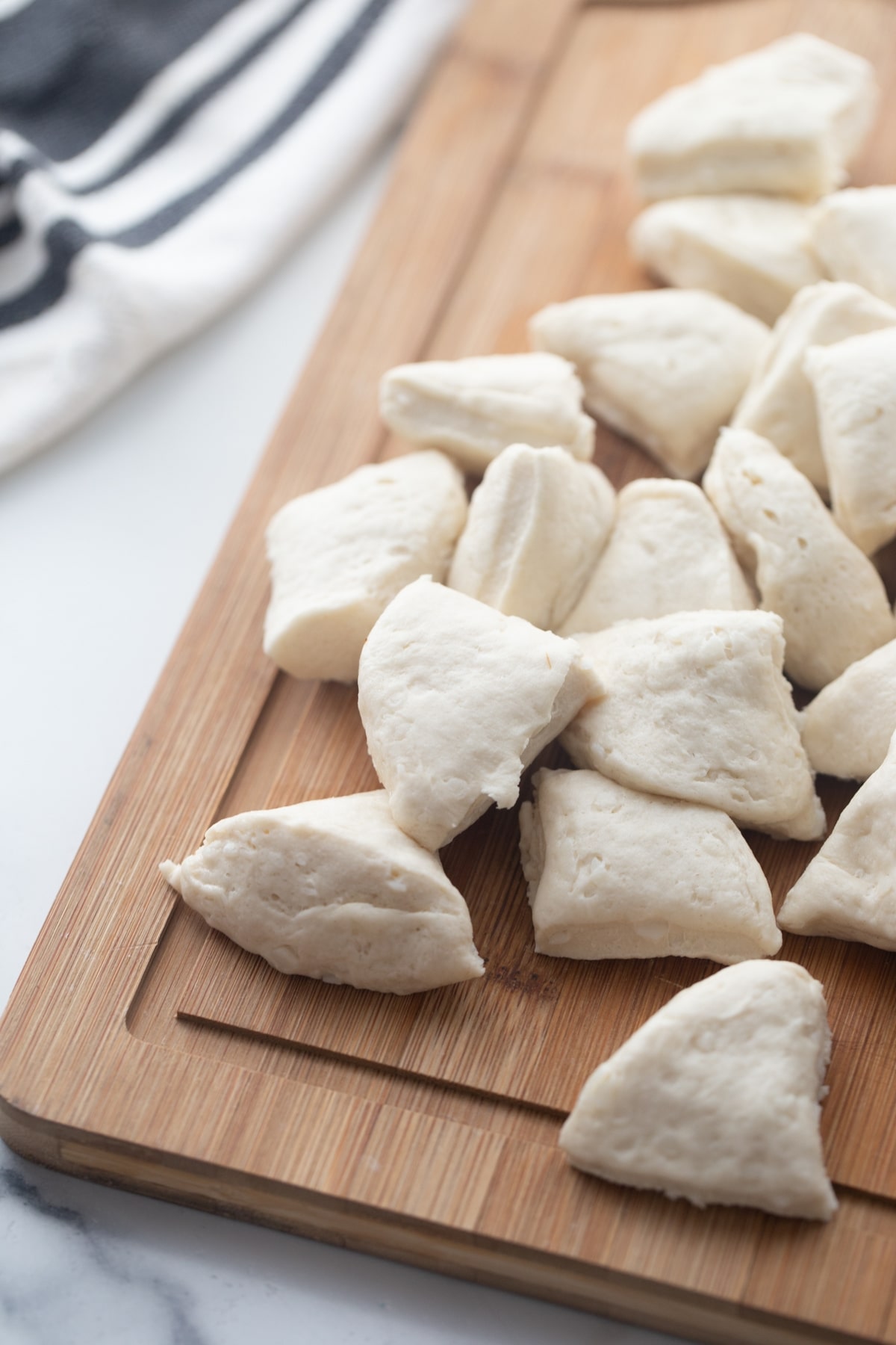 Biscuit dough for pull-apart bacon bread refrigerator biscuit dough cut into pieces for pull-apart bacon bread