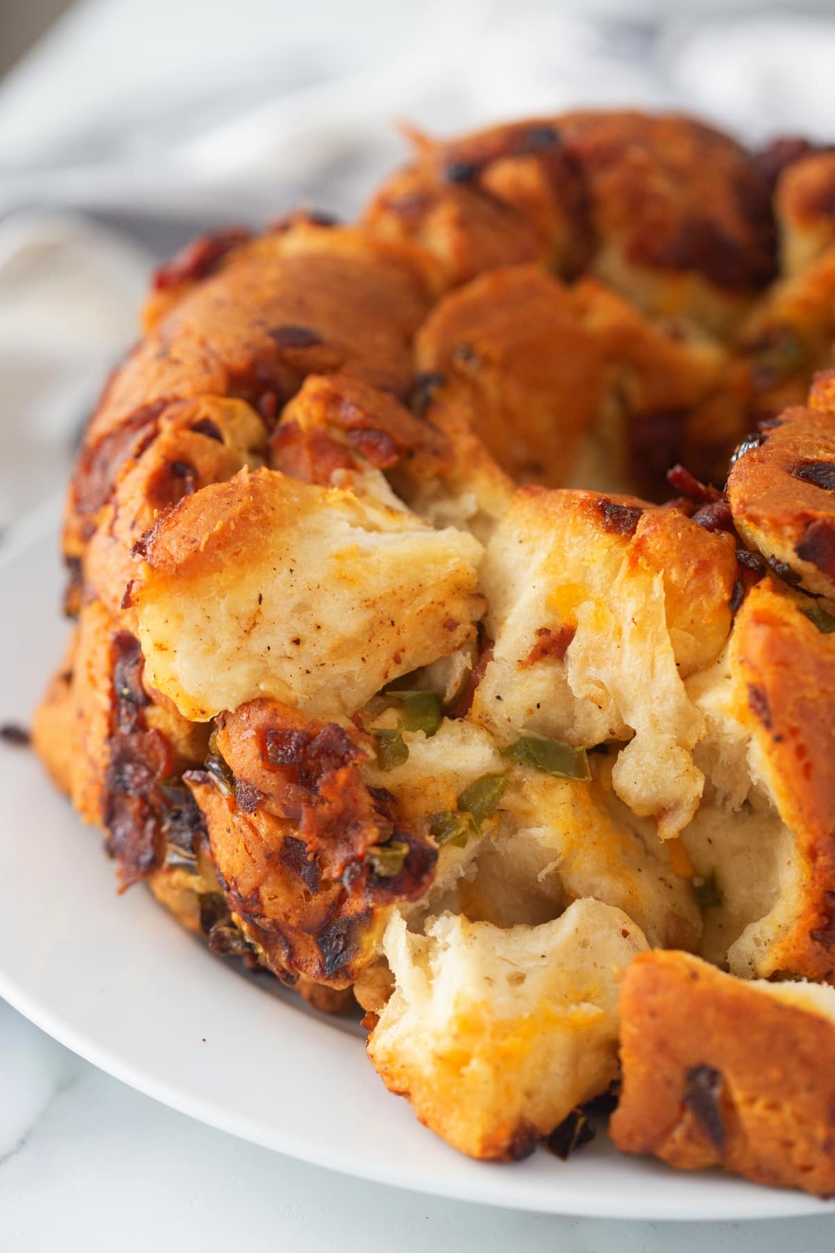 Pull-Apart Bacon Bread on a plate pull-apart bacon bread showing the interior