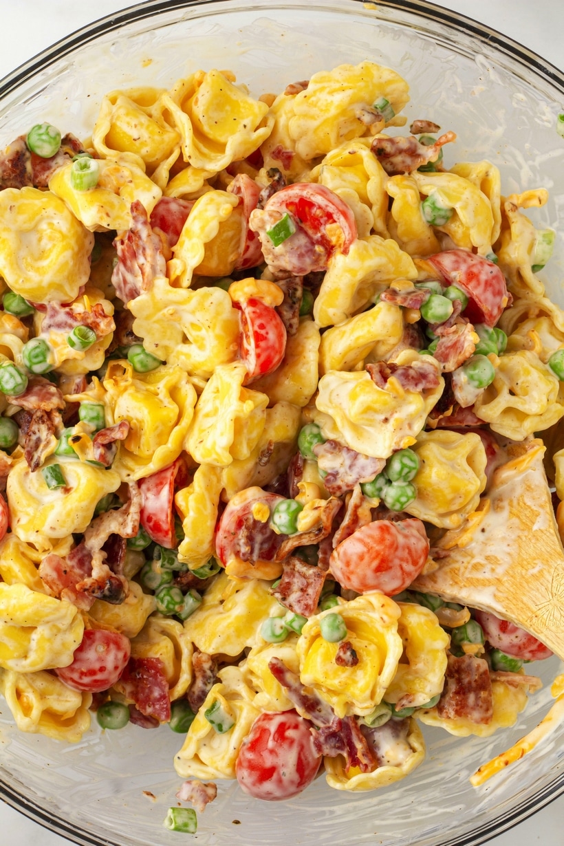 This bacon ranch tortellini salad is my go-to for potlucks and weeknight dinners when I need something quick and tasty. It’s creamy, delicious, and even though it’s a summer classic, I find myself making it all year long. ranch pasta salad