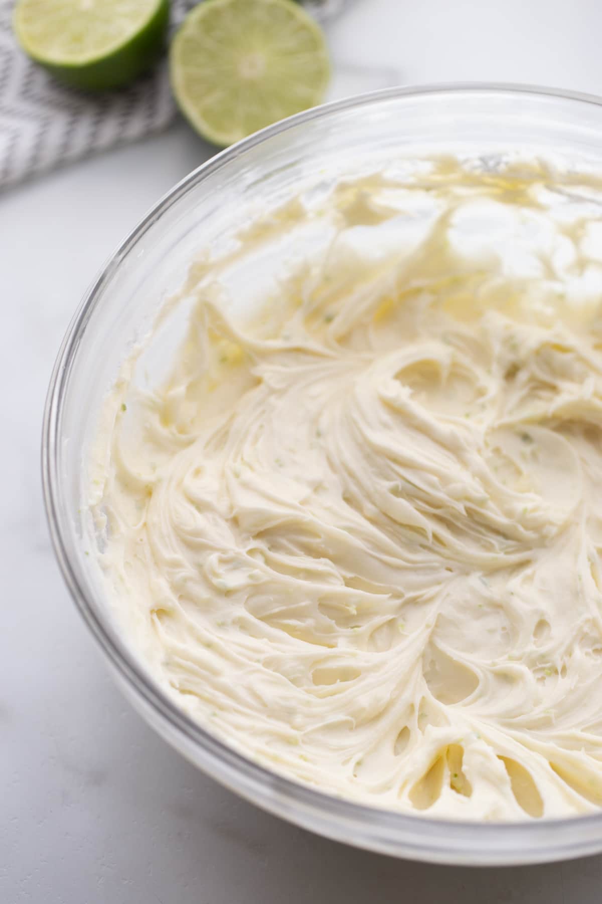 Cream cheese lime frosting in a mixing bowl, ready to use