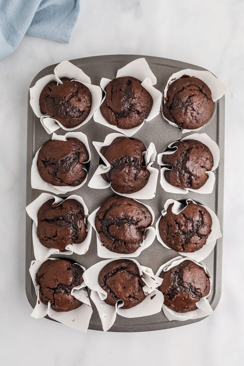 I wish every morning started with a double dose of chocolate deliciousness! These cake-like muffins will have you smitten they minute they come out of the oven. cake mix muffins