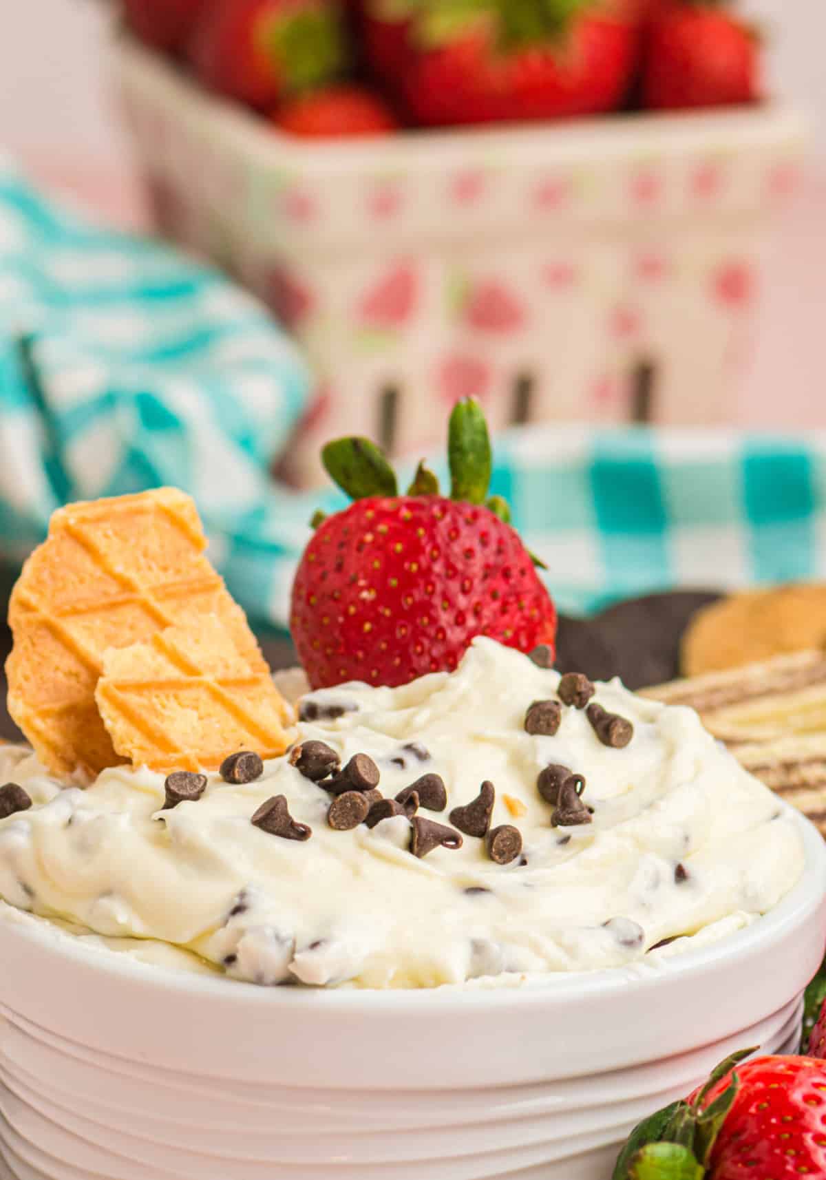 Close-up of cannoli dip with toppings Close-up of cannoli dip topped with a waffle cone piece, strawberry, and chocolate chips
