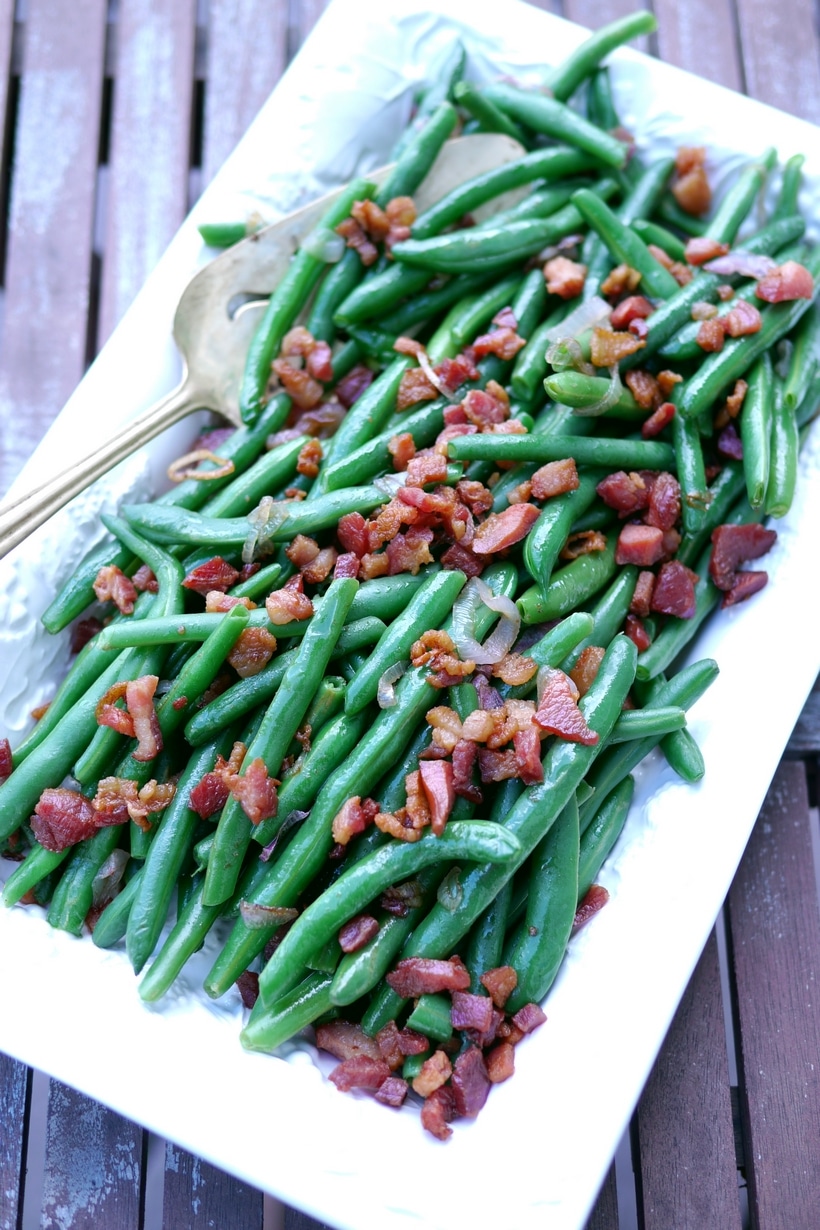 Green beans and bacon are a perfect combination of flavors for Thanksgiving. fresh green beans with bacon