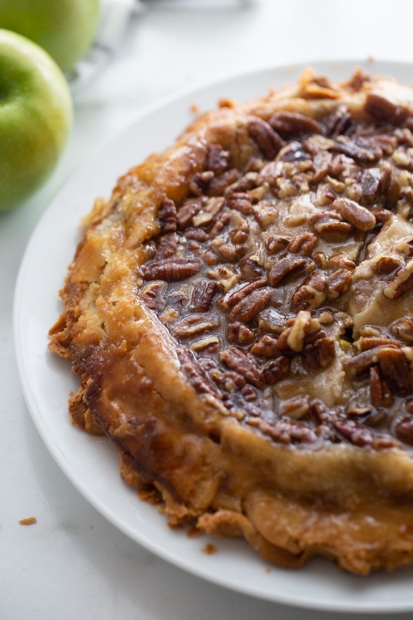 This Upside Down Apple Pie is a delicious way to celebrate Fall. The best part…no crust making skills are necessary to make this gorgeous pie. It turns out perfect every time. upside down apple pie