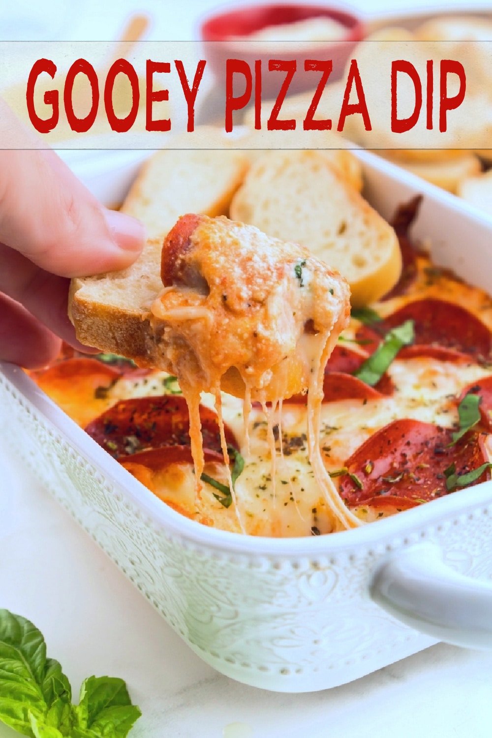 This gooey pizza dip is perfect any night of the week. It’s got all the cheesy, pepperoni goodness you crave, and everyone will be digging in. via @cmpollak1