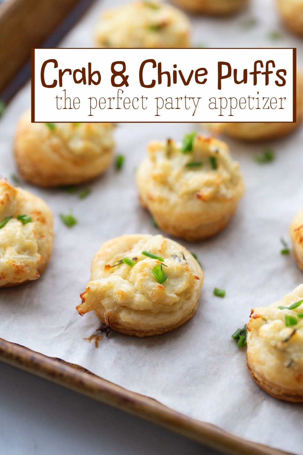 Crab and Chive Puffs are a quick and elegant party appetizer made with flaky puff pastry, tender crab meat, and a creamy chive-infused filling. These savory bites are the ultimate finger food for any gathering, big or small. via @cmpollak1