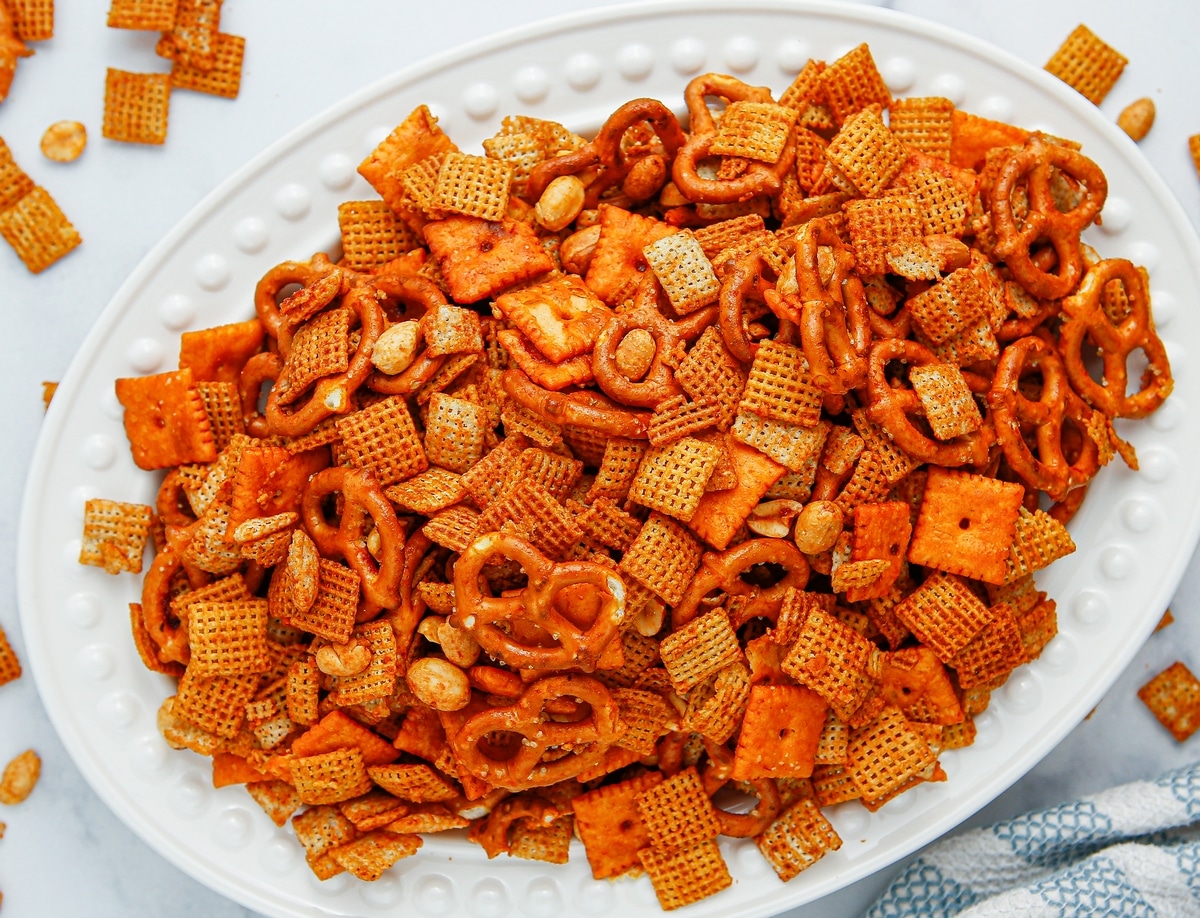 Overhead shot of BBQ Chex mix in a bowl, showcasing its crunchy texture.