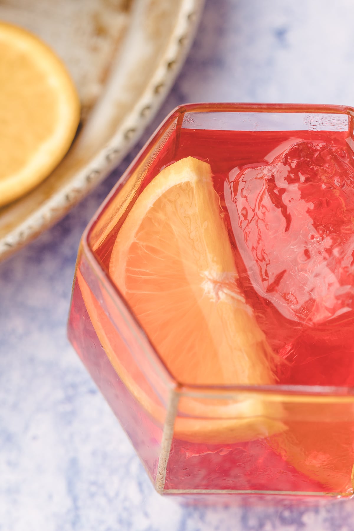 Close-up of a balanced Negroni cocktail with orange garnish Close-up of a Negroni cocktail highlighting the orange peel and balanced ratio.