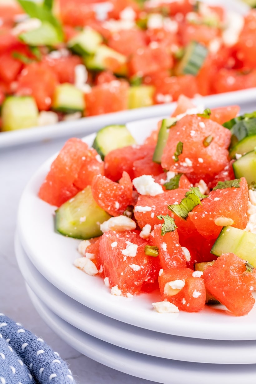 Refreshing watermelon cucumber salad with feta and mint Top-down view of watermelon feta mint salad showing contrast of ingredients