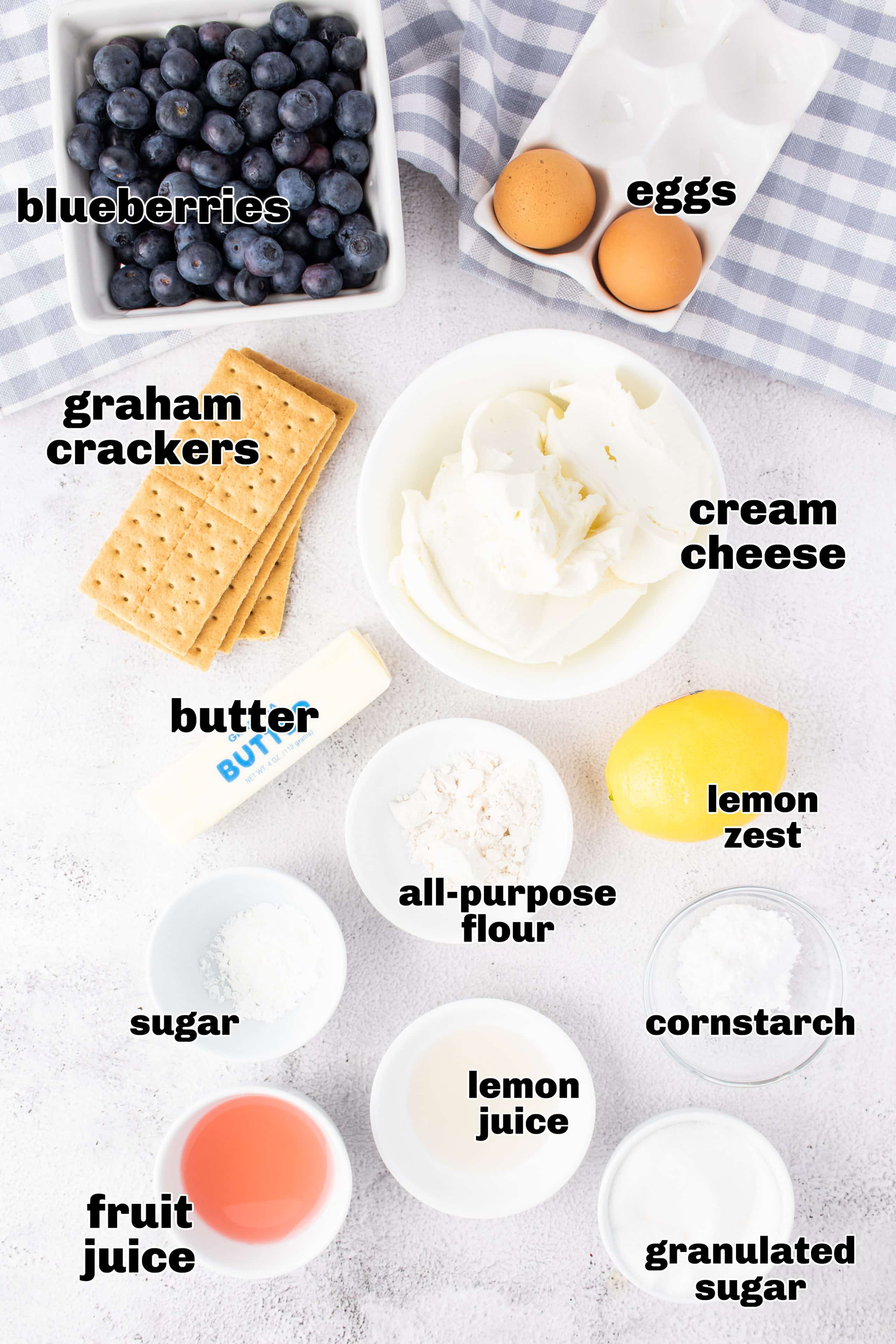  Ingredients laid out for blueberry-topped mini cheesecakes