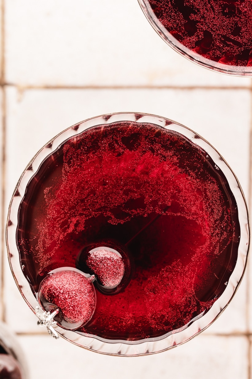 This sophisticated and unique version of a Cherry Martini is like no other you've experienced. Its incredibly punchy, but velvety, cherry flavor profile is balanced and its crimson, red color is captivating. Edible glitter is optional, but recommended if you're wanting to make a bold statement. cherry martini cherrytini
