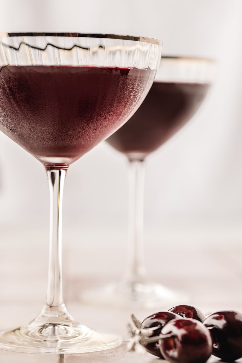 This sophisticated and unique version of a Cherry Martini is like no other you've experienced. Its incredibly punchy, but velvety, cherry flavor profile is balanced and its crimson, red color is captivating. Edible glitter is optional, but recommended if you're wanting to make a bold statement. cherry liqueur cocktails