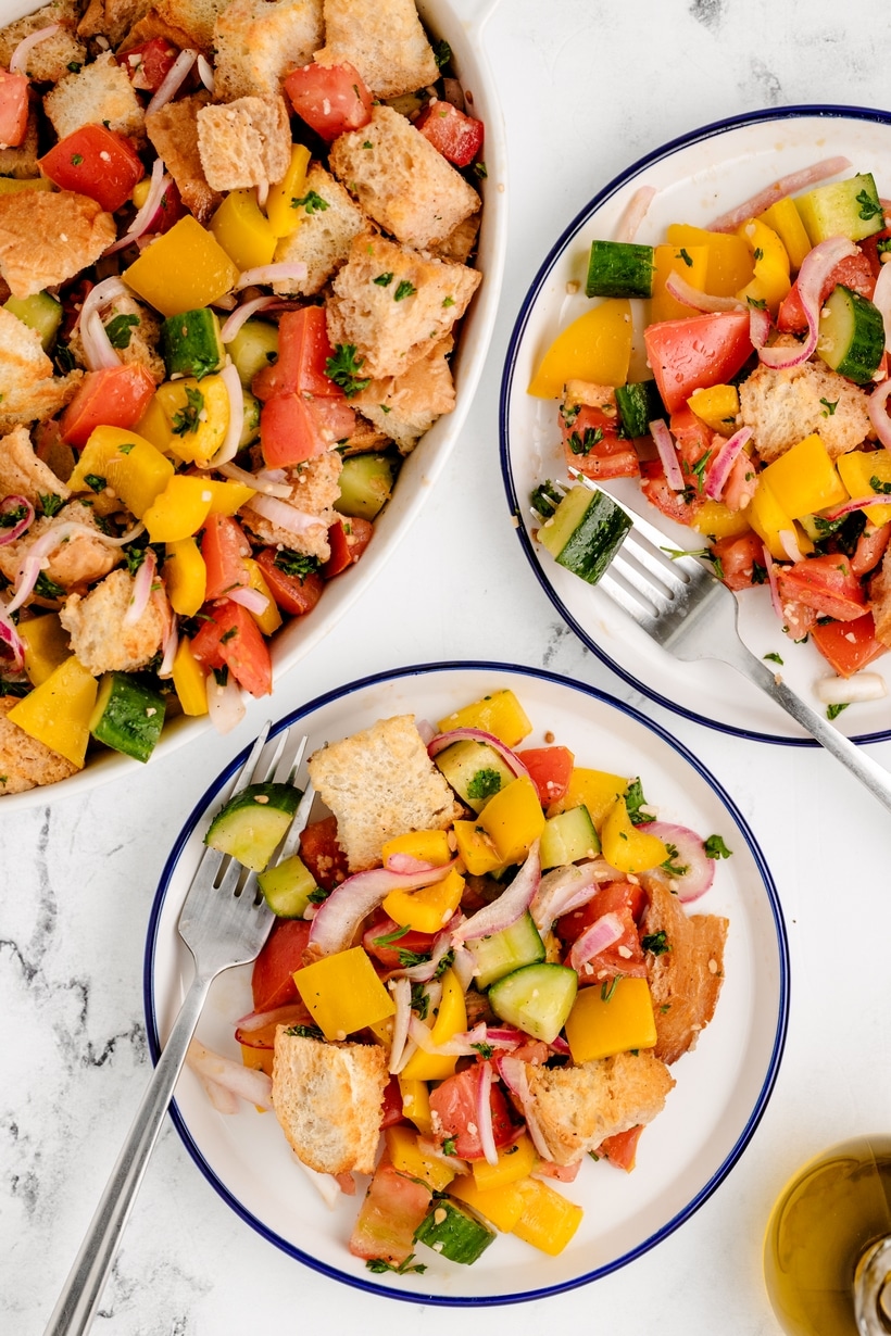 Panzanella, or Italian bread salad, is a Tuscan favorite that's hard to resist. It's all about that perfect combo of crusty, day-old bread soaking up the juices from the ripest, juiciest tomatoes—once you start, it's impossible to stop. panzanella
