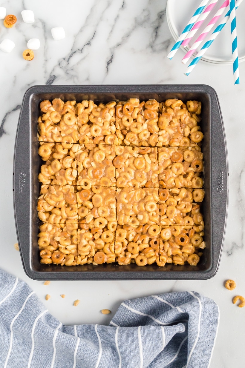Looking for a quick and tasty snack? Try these delicious Peanut Butter Cheerio Bars. This easy recipe for Cheerios cereal bars is perfect for satisfying your sweet tooth and there isn't a better time than back-to-school season to enjoy them. cheerios cereal bars