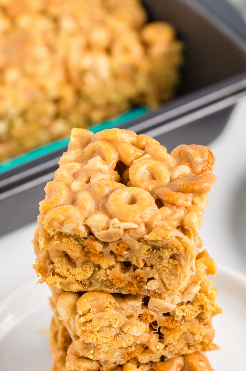 Looking for a quick and tasty snack? Try these delicious Peanut Butter Cheerio Bars. This easy recipe for Cheerios cereal bars is perfect for satisfying your sweet tooth and there isn't a better time than back-to-school season to enjoy them. cheerios no bake bars