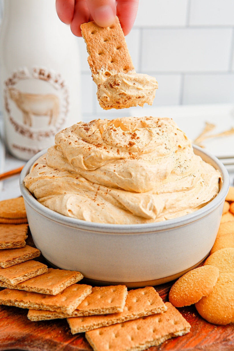 This Pumpkin Cheesecake Dip combines the warm, comforting spices reminiscent of traditional pumpkin pie with the smooth, creamy and luscious richness of a scoopable, cheesecake filling. The possibilities for dippables are endless, allowing you to unleash your creativity and use what you love. This is a dessert dip your family is going to love. dessert dip dippers for pumpkin dip